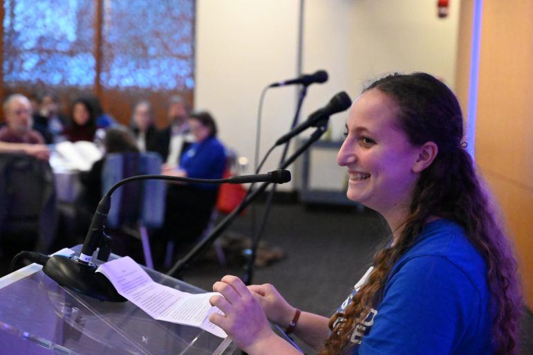 ariana-at-labor-seder-2019 woman smiling at podium