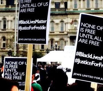 signs Signs: None of us is free until all of us are free. #BlackLivesMatter #JusticeForFreddie