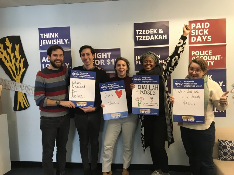 jufjunionizes JUFJ team members pose with smiling faces after successfully unionizing