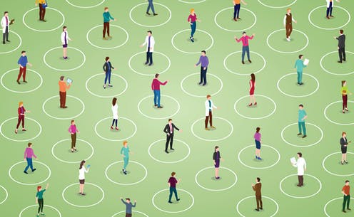 socially distant people on field